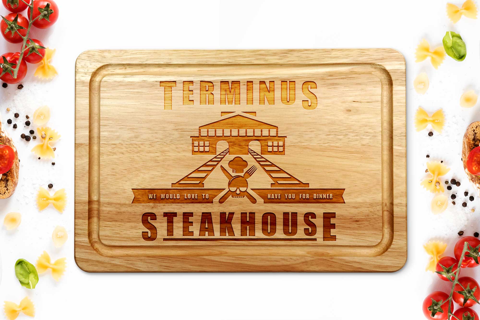 Terminus steakhouse chopping board on a white worktop