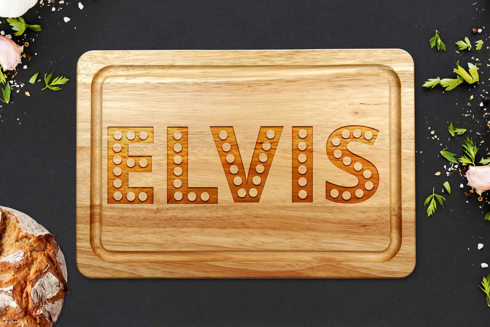 Elvis chopping board on a grey worktop