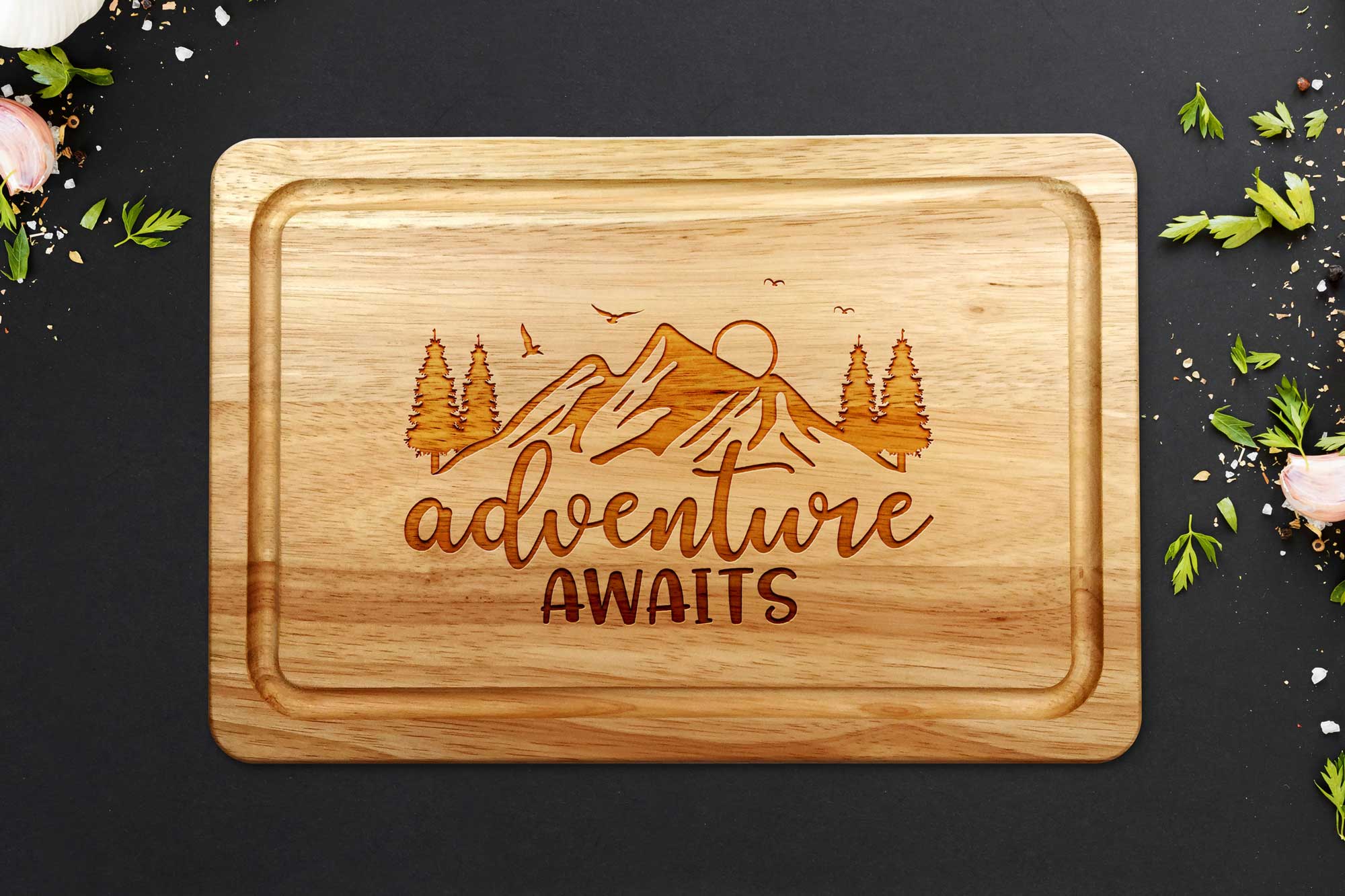 Adventure Awaits Chopping Board on a grey worktop