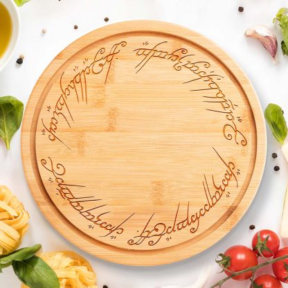 A lord of the rings round chopping board on a white background