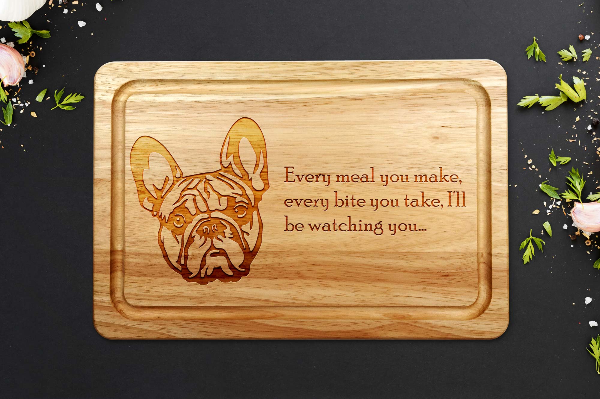 french bulldog wooden chopping board on a grey worktop