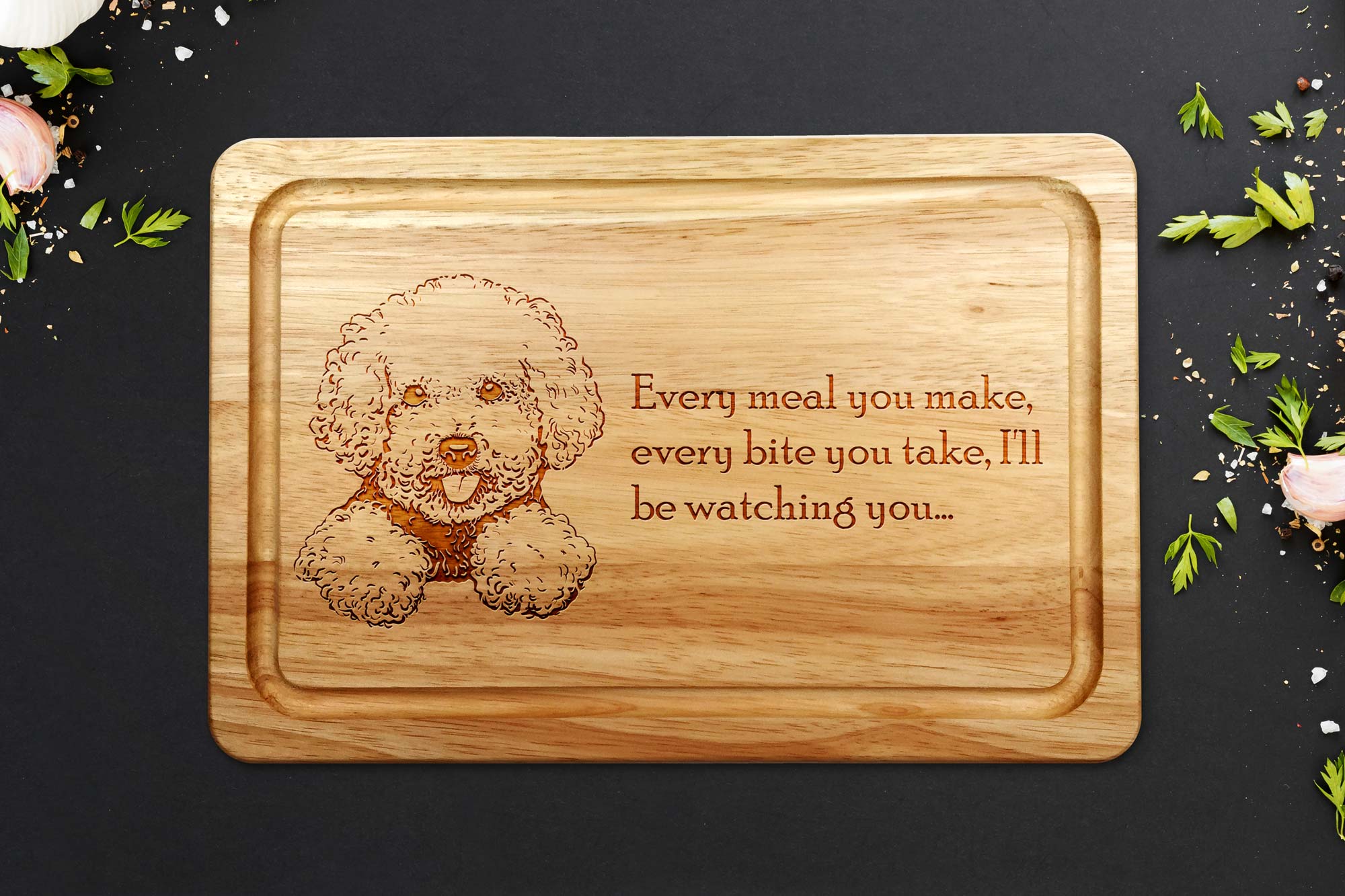 bichon frise chopping board on a grey worktop