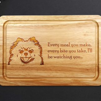 pomeranian chopping board on a dark work surface