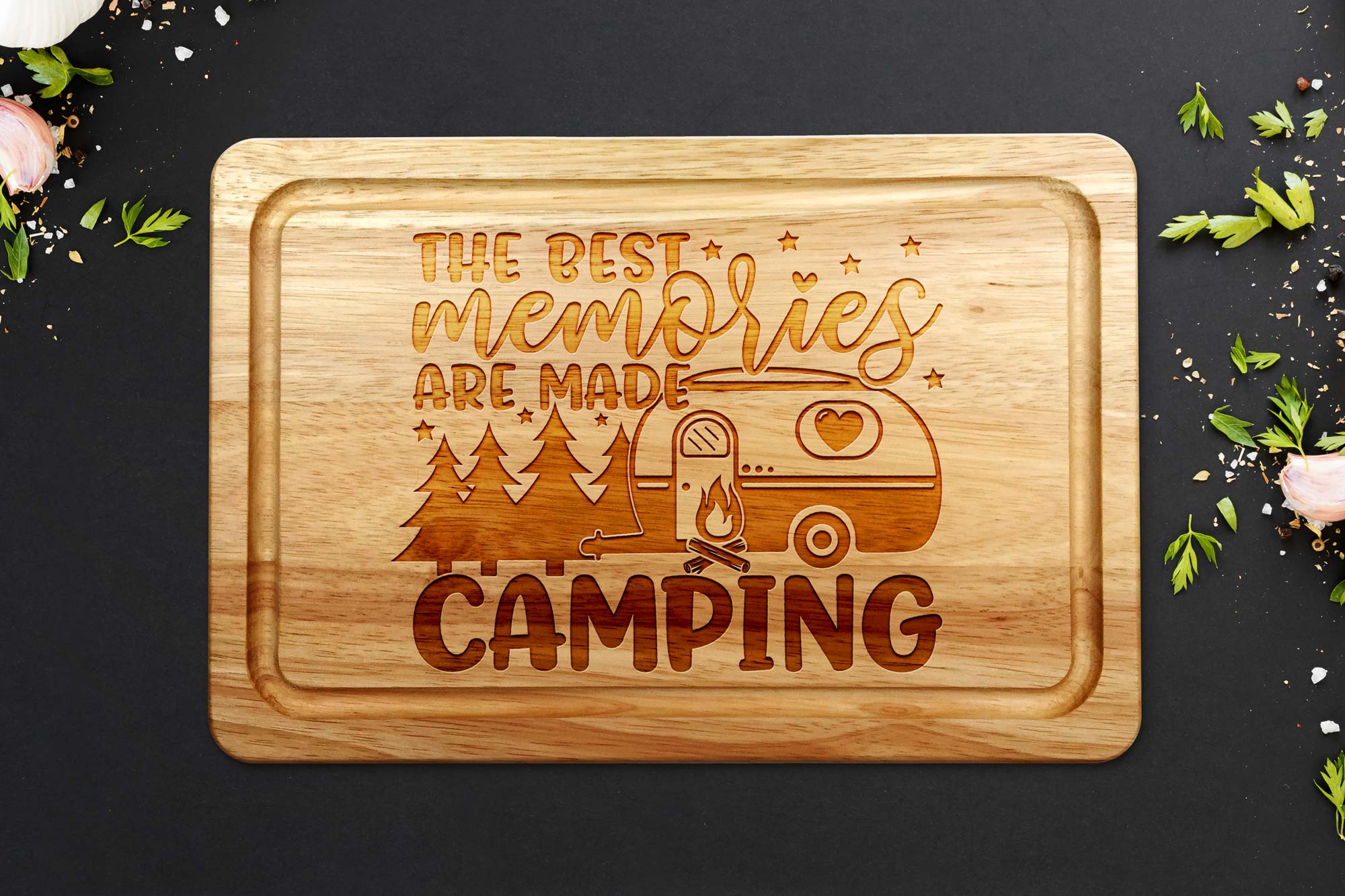 the best memories are made camping chopping board on a grey worktop