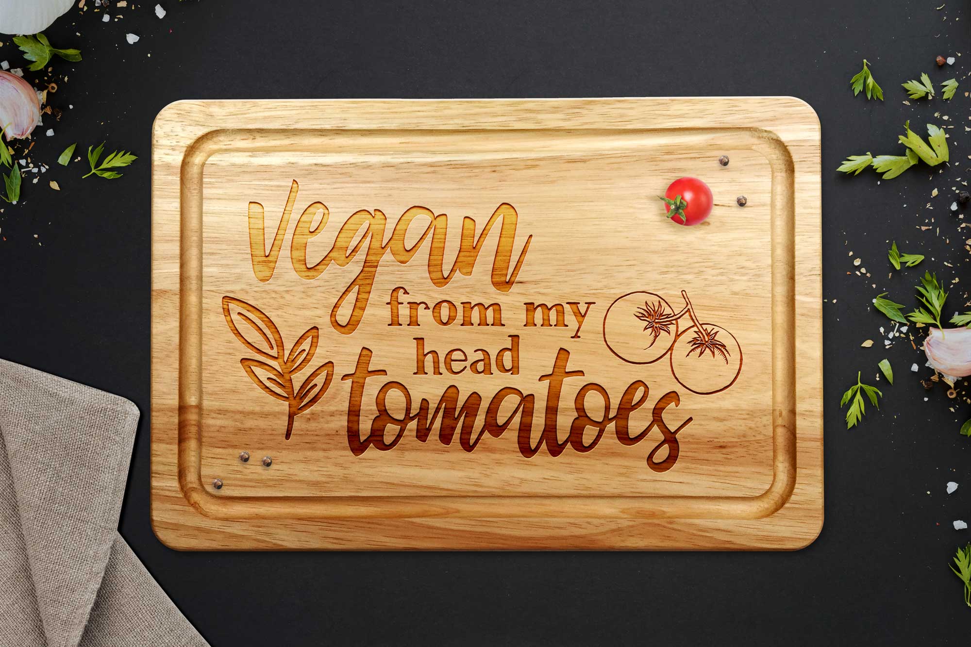 vegan from my head tomatoes--chopping board on grey worktop