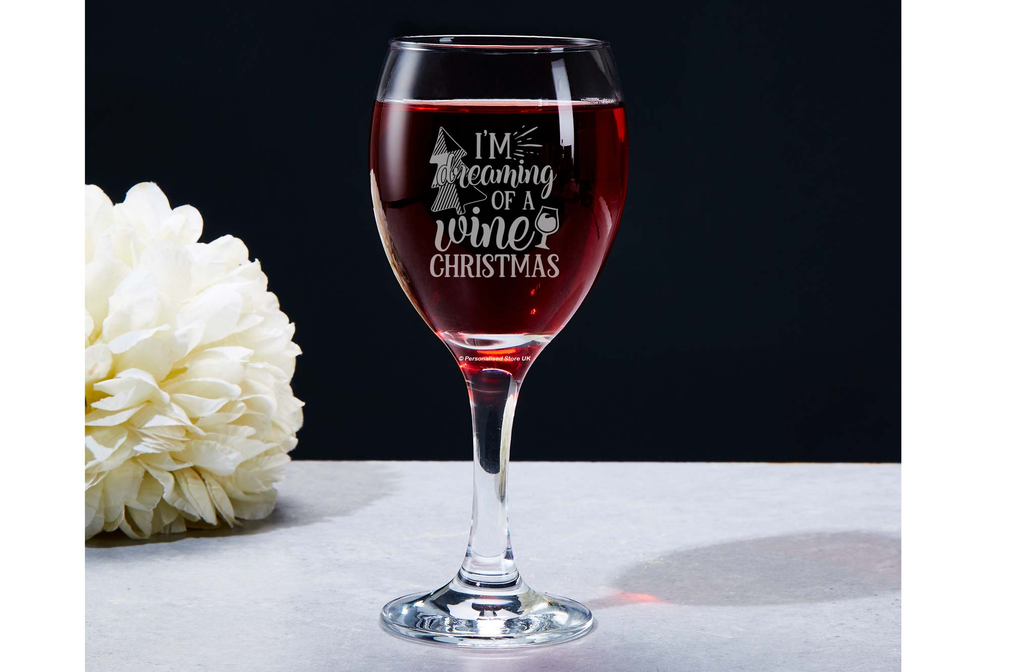 He sees you when you're drinking. Wine glass for Secret Santa gift.